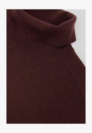 Pruun kõrge kaelusega kampsun, millel on pehme, tekstuuriga kootud materjal. Omadusteks kõrge krae ja raglaanvarrukad, mis annavad lõdvestunud, keha järgiva lõike.