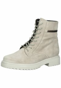 Bottine en daim beige avec bout rond, lacets gris à l'avant et détail de fermeture éclair latérale. Semelle extérieure blanche épaisse avec bande de roulement texturée.