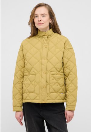 Yellow quilted jacket with stand collar, snap buttons, two front pockets, and a textured diamond pattern. Warm, casual design suitable for cooler weather.