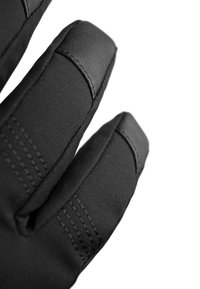 Black gloves made of a textured, stretchy material featuring reinforced fingertips and stitching details, designed for improved grip and flexibility.
