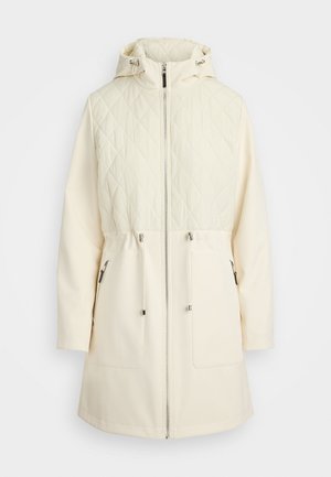 Quilted cream-colored jacket featuring a hood, zippered front, and drawstring waist. Soft, smooth fabric with side pockets.