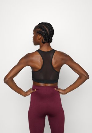Reggiseno sportivo con sostegno leggero - black