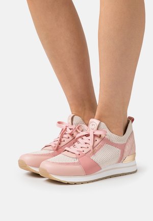 Light pink athletic shoes with mesh and synthetic leather, featuring a textured design, round laces, and a small logo on the tongue.