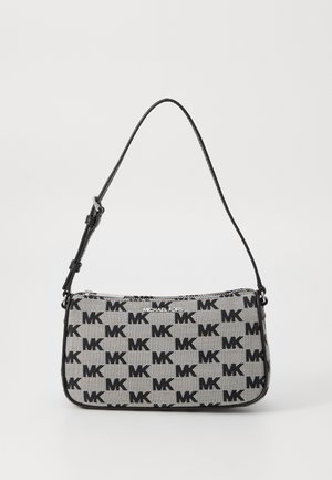 Black and grey patterned handbag from Michael Kors, featuring a zip closure and a shoulder strap with adjustable length.