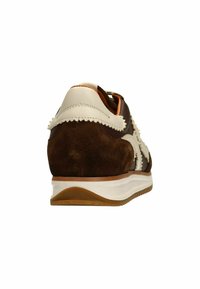 Brown suede sneaker with white leather accents, scalloped detailing, and a white midsole. Features a textured rubber outsole.