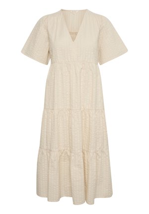 Lagdelt, cremefarvet kjole med V-hals, korte ærmer og struktureret stof. Har en sammensamlet talje og flydende silhuet.