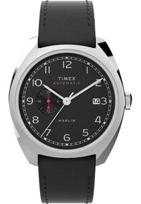 Timex Marlin automatic watch with a black dial, silver case, and a black leather strap. Features include white hour markers and a date display.