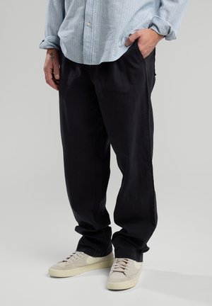 America Today PHILLON - Trousers - washed black