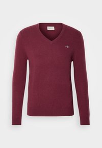 - Sweter