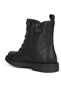 Stivale alla caviglia in pelle nera con zip laterale, punta rotonda e lacci frontali con occhielli in metallo. Suola in gomma spessa per il massimo comfort.