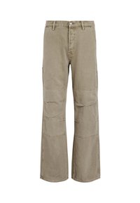 Beige cargo pants made of cotton with wide legs, multiple pockets, and visible stitching details. Features a front button and zipper closure.