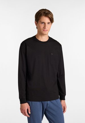 Schwarzes Langarm-T-Shirt mit rundem Halsausschnitt und einer Brusttasche. Aus Baumwolle gefertigt und mit einem dezenten Logodesign auf der Tasche.