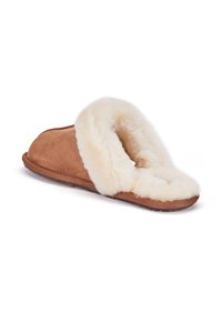 Brown suede slipper with a fluffy cream-colored fur lining. Open back design with a textured sole for grip.