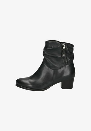 Schwarze Leder-Ankle-Boots mit einem weichen Schaft, seitlichem Reißverschluss, runder Spitze und einem gestapelten Absatz. Glatte Textur und minimales Design.