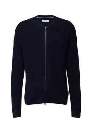 Granatowy sweter zapinany na zamek, wykonany z fakturowanego materiału; posiada okrągły dekolt, długie rękawy oraz prążkowany dół i mankiety.