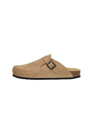 Beige suede clog with a wide strap and a black metal buckle. Contoured cork footbed and textured black rubber sole.