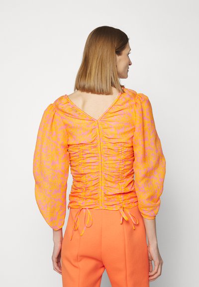 Rodebjer T-shirt à manches longues - orange haze