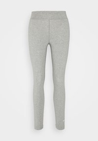 Leggings grises hechos de una tela suave y elástica, con una cintura alta y un pequeño logo blanco cerca del tobillo, diseñados para la comodidad y el movimiento.