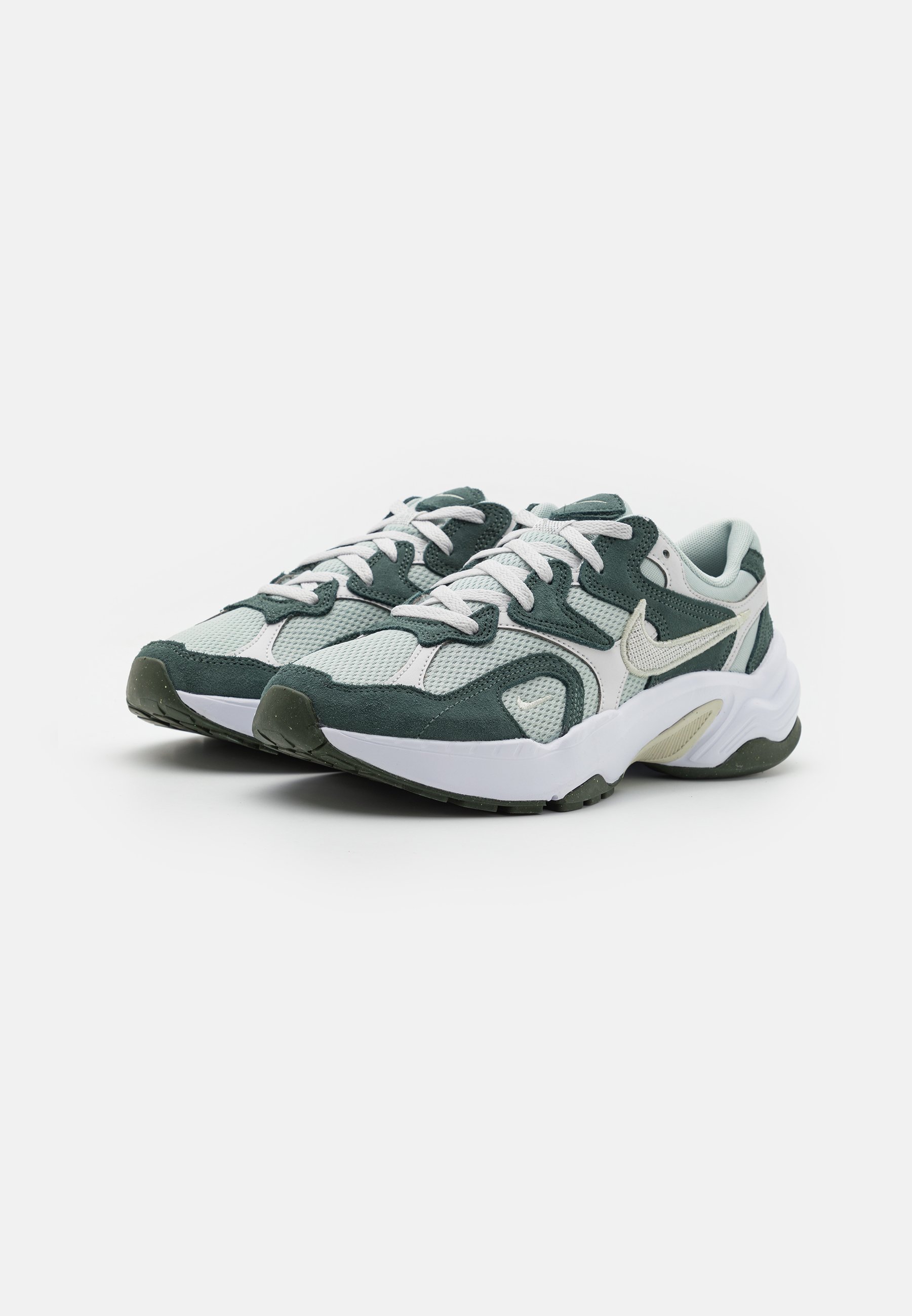 nike green and white trainers