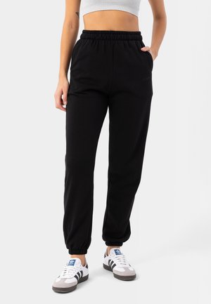 ESSENTIALS  - Tracksuit bottoms - black