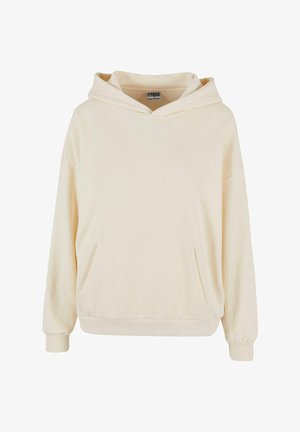 Lichtbeige hoodie met een voorzak, oversized pasvorm en geribbelde manchetten. Glad stofstructuur en een capuchon met trekkoord kenmerken de belangrijke ontwerpelementen.