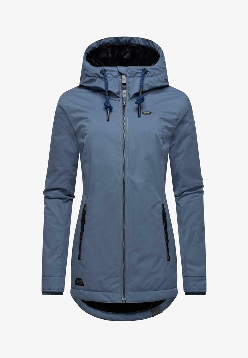 Világoskék dzseki kapucnival, cipzárral és húzózsinórral. Két oldalsó cipzáras zsebbel és puha, sötét színű bélésbelsővel rendelkezik.