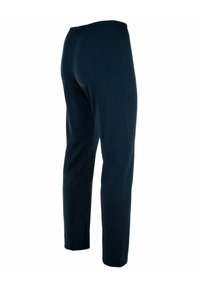 Marineblauwe sweatpants gemaakt van zachte stof, met een elastische tailleband, slim fit en zonder zichtbare zakken of versieringen.