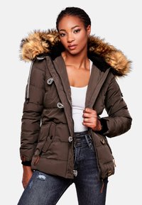 Puffer jacket in olive green with a faux fur-lined hood, multiple buttons, and adjustable drawstrings. It features a quilted design and pockets.