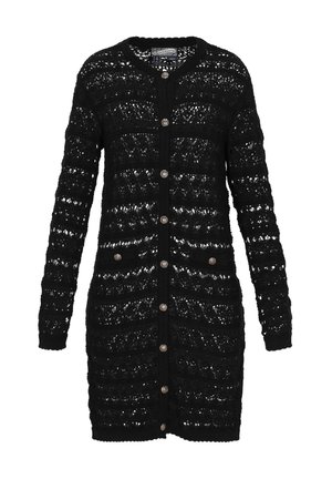 Juodas megztinis su nėriniuota raštu, ilgomis rankovėmis, priekiniais mygtukais ir dekoratyviniais sidabro mygtukais. Turi laisvą siluetą.