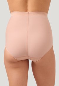 Shapewear a vita alta in morbido e elastico tessuto, caratterizzato da un colore nudo e liscio e da una cucitura sottile sul retro per un fit appena accennato.