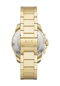 Guldtonet metalurrem med spænde, der viser "A|X Armani Exchange" logoet, forbundet til bagsiden af et chronografur.
