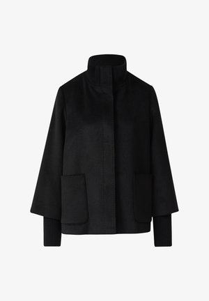 Black jacket with a high collar, made of smooth fabric. Features ribbed cuffs and two front pockets with flap closures.