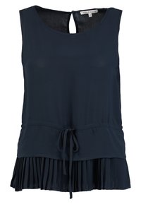 Marinblå ärmlös topp med knytdetalj vid midjan och en plisserad nederdel. Mjuk tyg med en slät textur. Nyckelhålsöppning i ryggen.