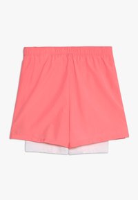 Nike Performance Pantalón corto de deporte - pink