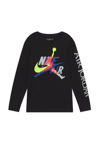 Mustat pitkät hiharatoppi, jossa on monivärinen Nike Air -grafiikka edessä ja "AIR JORDAN" valkoisena hihassa. Puuvillamateriaalia.