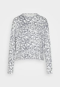 Bluza z długim rękawem w szaro-biały wzór w panterkę. Posiada zaokrąglony dekolt i miękką teksturę. Krój cropped.