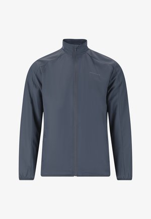 Veste zippée bleu marine avec col haut, manches longues, poignets élastiques et poches latérales zippées, arborant un discret logo "Endurance" sur la poitrine.