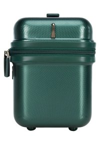Valigia rigida verde con motivo esagonale, design slim, maniglia superiore, doppia zip e piedini piccoli per stabilità.
