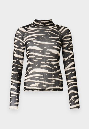 Haut à manches longues en tissu noir transparent avec des rayures abstraites blanches, col montant et coupe ajustée, mettant en valeur un motif moderne.