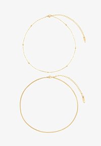 Ausgewählt, goldfarben