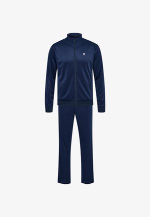 Marineblaue Trainingsanzug aus glattem, atmungsaktivem Stoff; besteht aus einer Jacke mit Reißverschluss und hohem Kragen sowie passenden geraden Hosen.