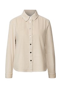 Beige corduroy overhemd met lange mouwen, een puntige kraag en zwart-witte drukknoopjes aan de voorkant.