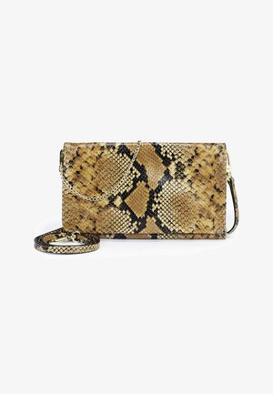 Rectangular clutch with tan and black snakeskin pattern, gold chain strap draped over, and detachable matching shoulder strap coiled beside it.