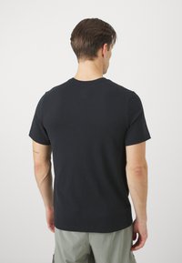 Nike Performance TEE SLUB - Camiseta deportiva - black