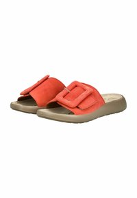 Coral suede slide sandals with a large decorative buckle, cushioned footbed, and a flexible beige rubber sole.