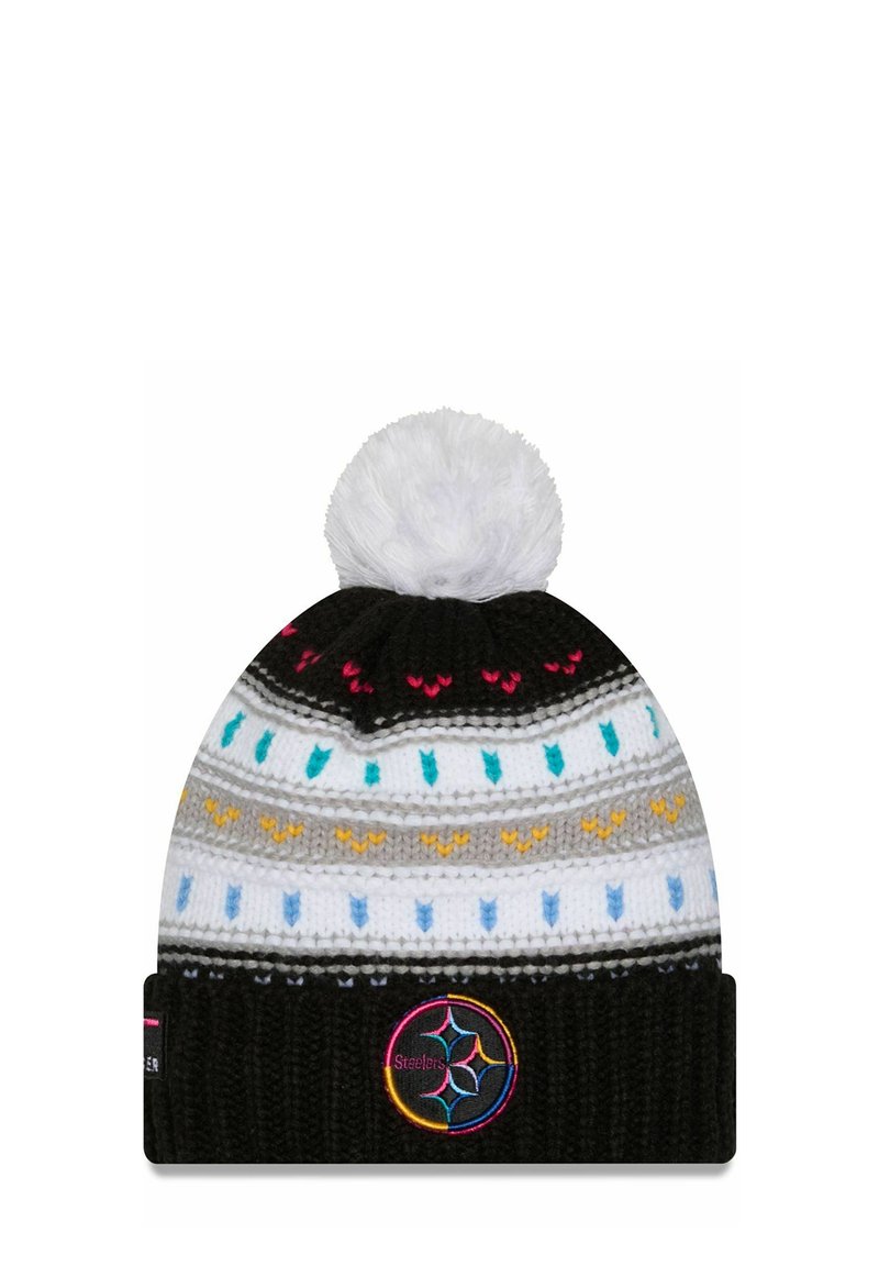 Knit beanie in black with a white pom-pom, featuring multicolored zigzag patterns and a logo patch on the cuff. Soft texture, rounded shape.