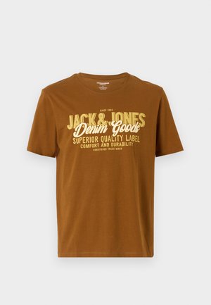 T-shirt de algodão castanho com mangas curtas e decote redondo. Impressão frontal em branco e amarelo com o nome da marca e detalhes do produto.