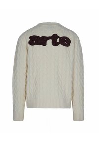 Maglione beige in maglia cable con maniche lunghe e orlo in costina; presenta un disegno astratto marrone scuro sul retro.