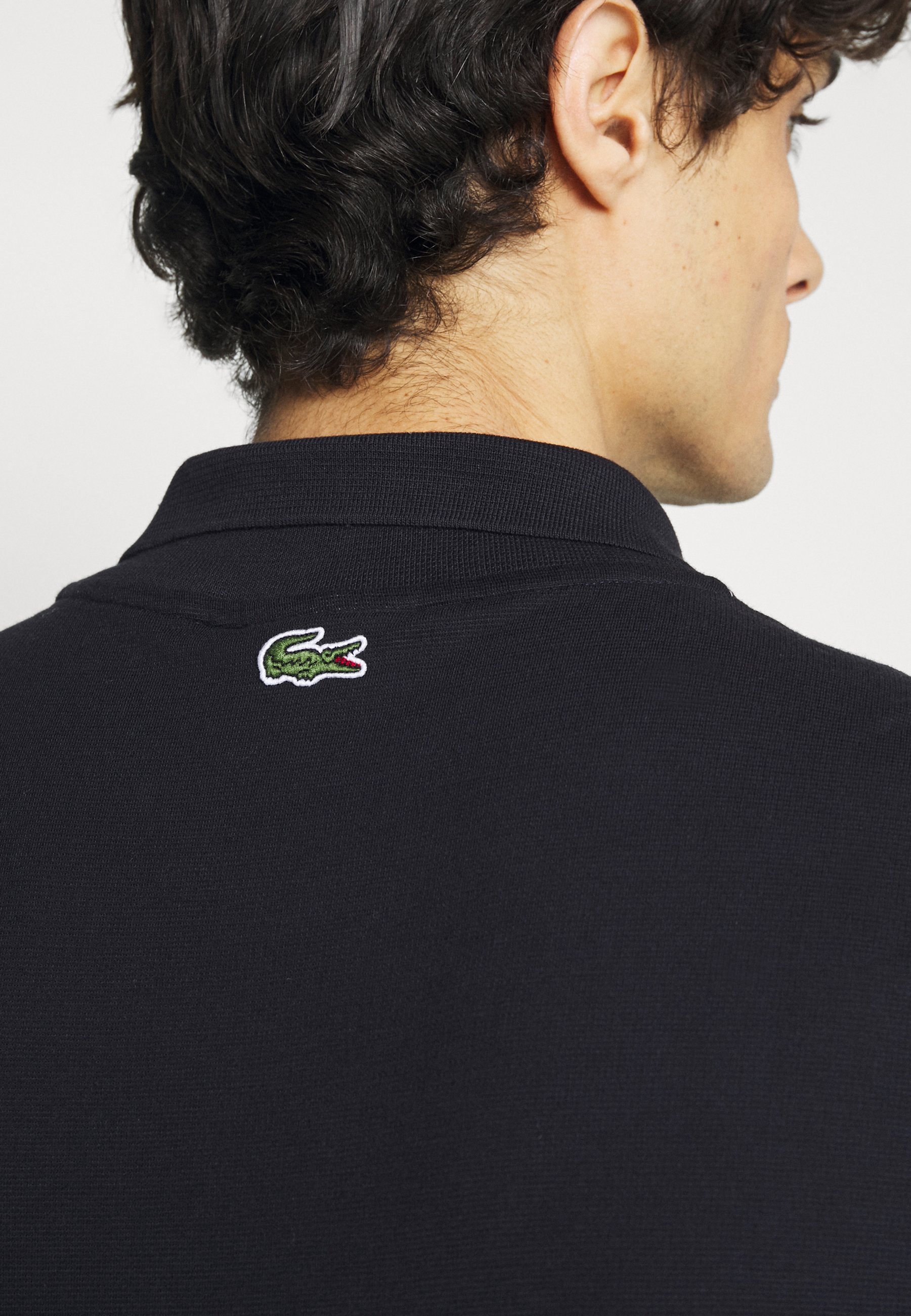 logo lacoste polo
