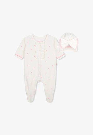 Wit babyrompertje met roze hartjesprint en ruches, gecombineerd met een bijpassende witte hoed met een grote strik.
